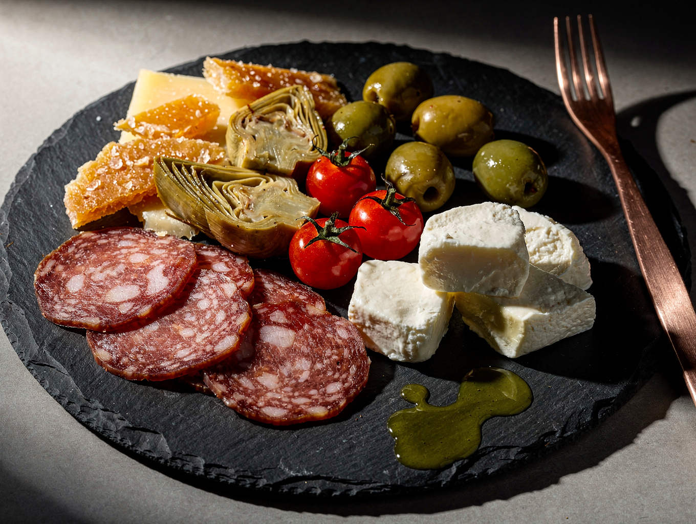 Artisanal antipasti board with cured meats and cheeses